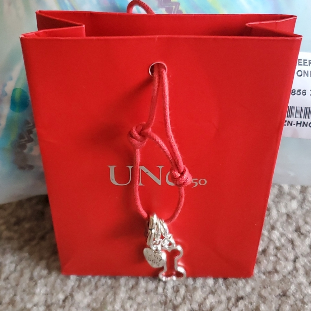 Uno de 50 adjustable red rope two pet charms
